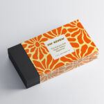 HW Renew Set of three skincare products in an orange floral box